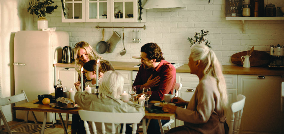 Family gathered around a table